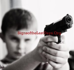 child holding gun violence titled