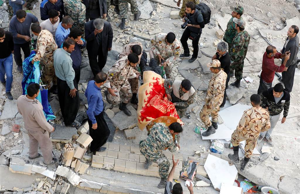 Death Toll Soars To Over 530 In Aftermath Of Iran Earthquake Signs Of